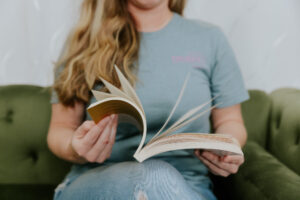 A patient with hyperactivity fiddles with a book before receiving an ADHD diagnosis in Dallas.
